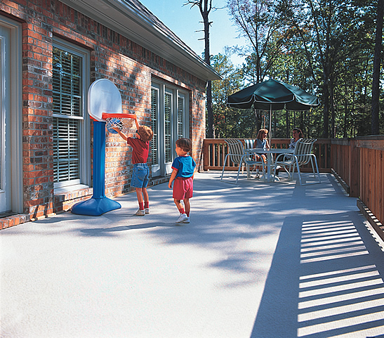 Community outdoor court and walkway finished in DeckRite vinyl