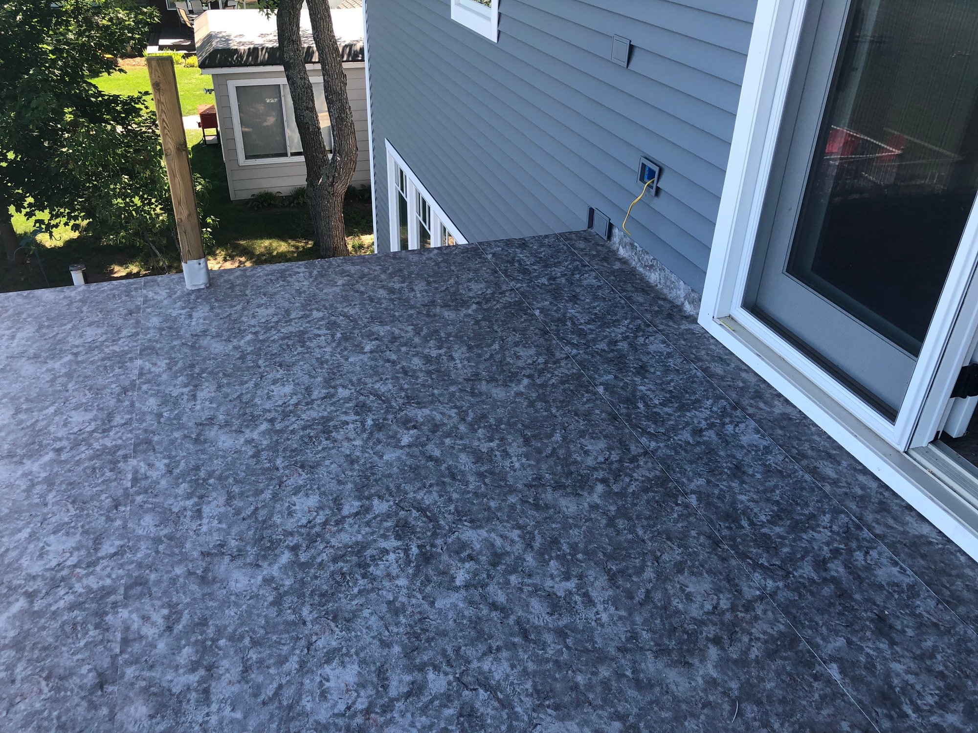 Marble-look DeckRite vinyl on a Cassville, Michigan walkout