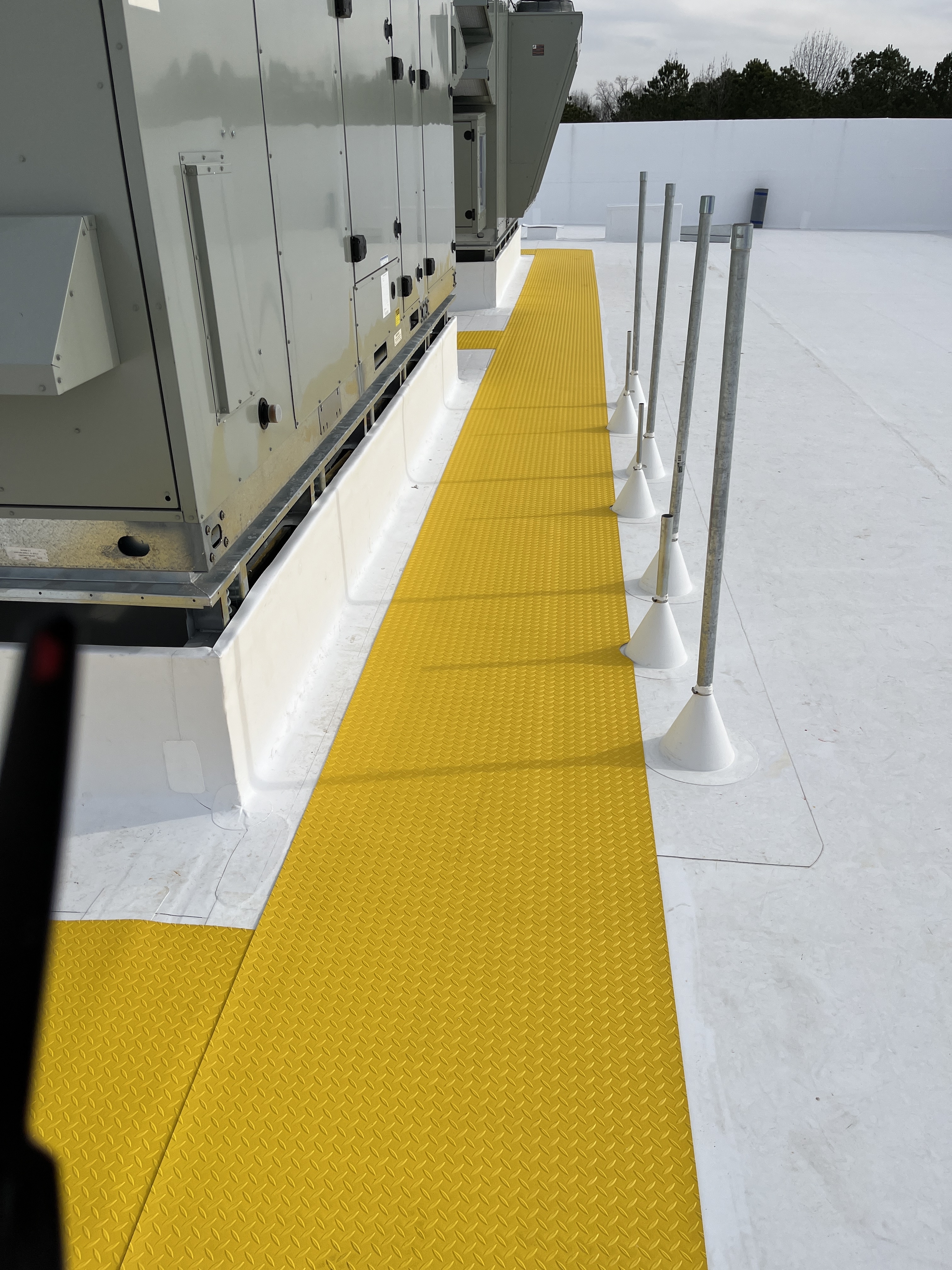 ProGuard walk tread installed on a commercial roof